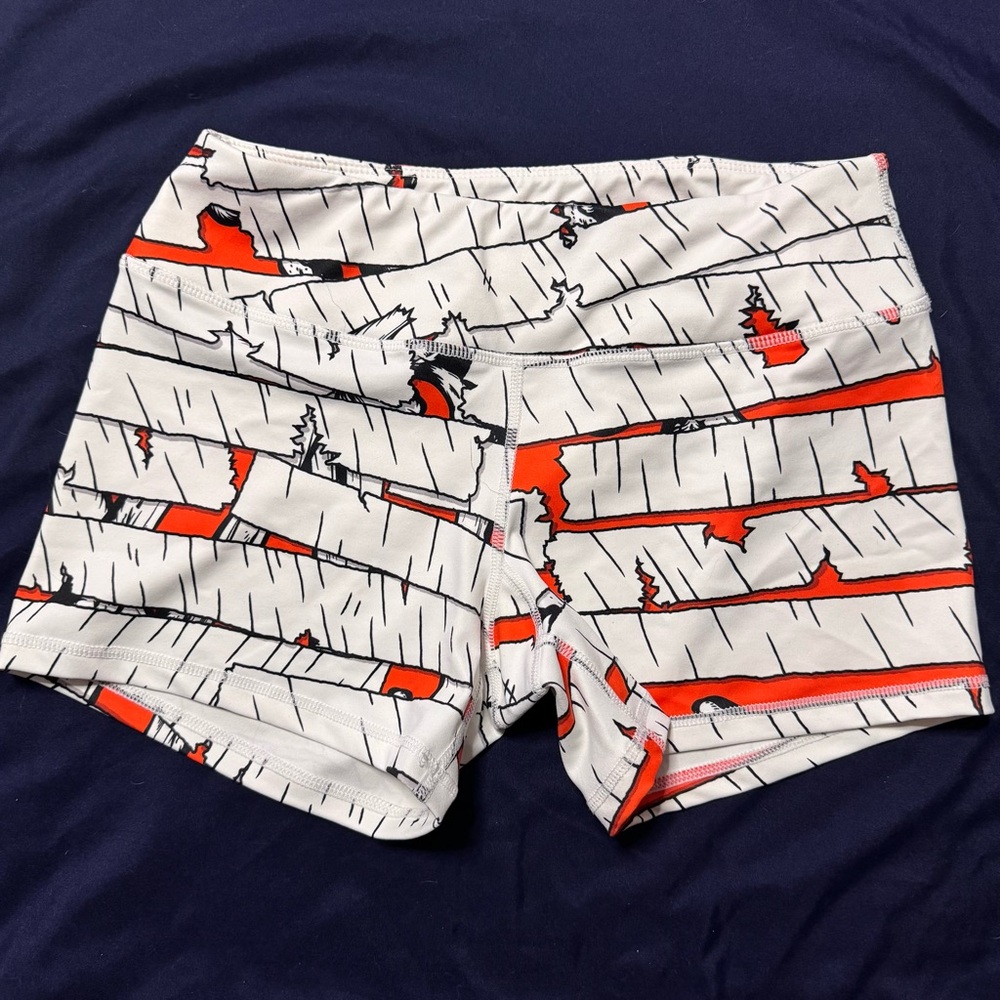 Born Primitive White and Orange Graphic Shorts